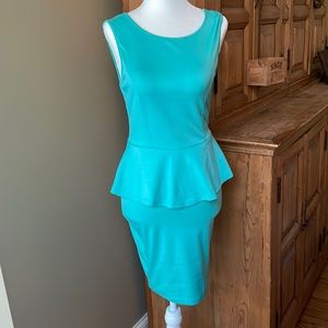 Love J peplum sleeveless dress. Light Torquose.